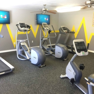 Fitness center with treadmills, elipticals, bike and flat screen tv's