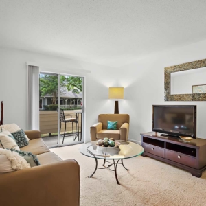 Large Living area of model home at Cypress lake, bright with lots of natural light