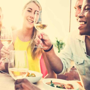 Friends at dinner toasting