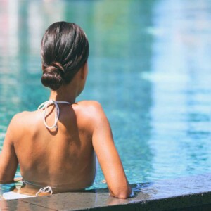 Girl relaxing in pool